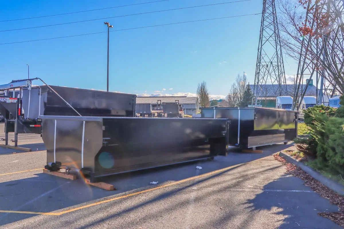 Roll-off dumpster ready for waste disposal at job site for Roofing Dumpster Rental in Mansfield